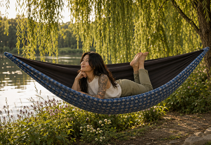 Botanica Solstice Premium Hammock beneath a willow beside the garden lake