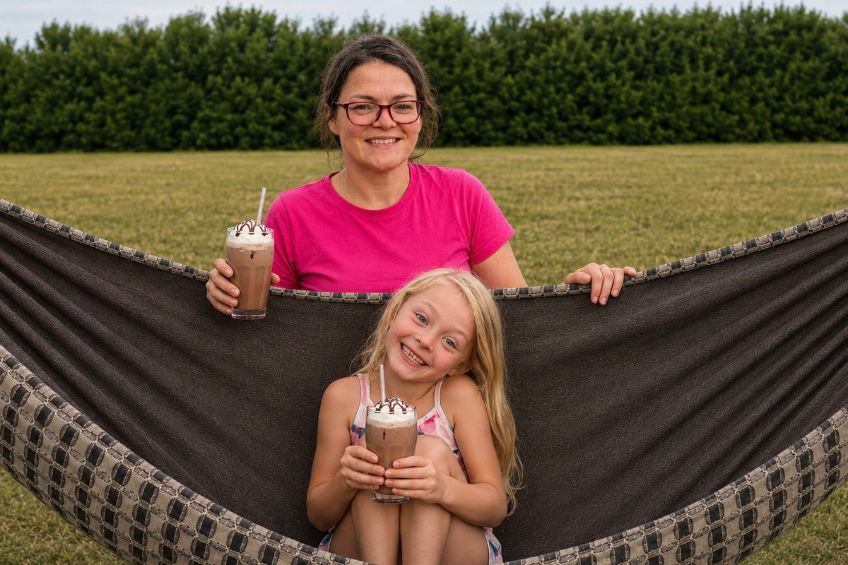 Mother and daughter enjoying chocolate milkshakes in Chocoholic Premium Hammock