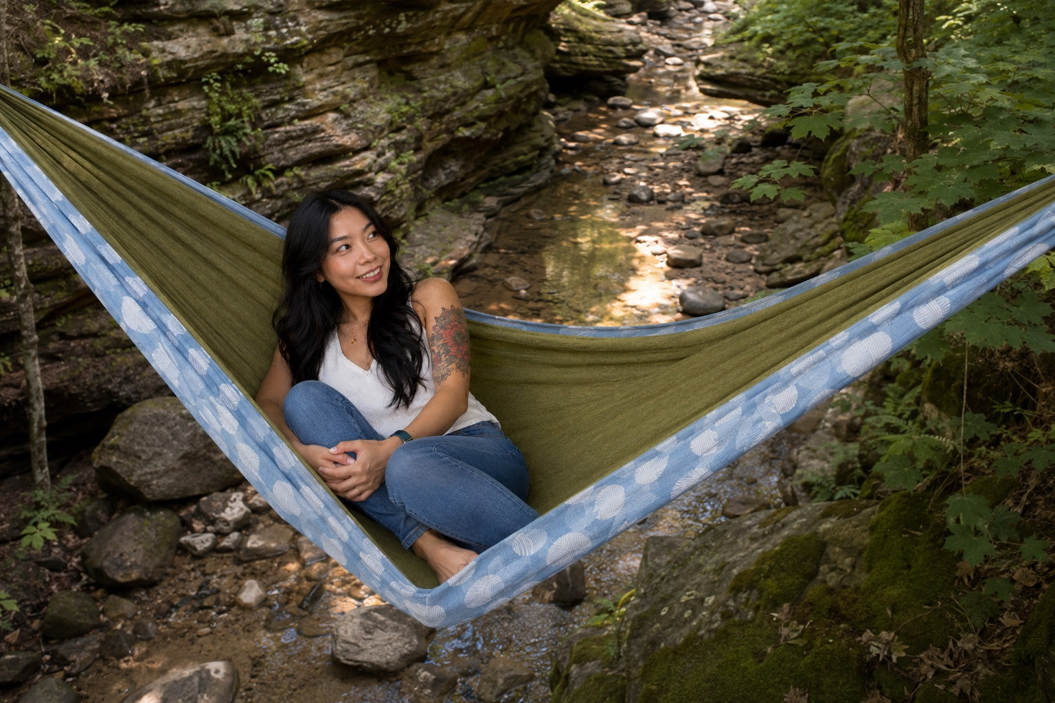 Overhead view of Fernwater Solstice Premium Hammock above a rocky creek