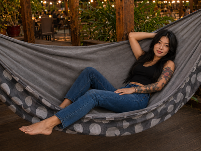 Model relaxing in the Moonstone Solstice Premium Hammock