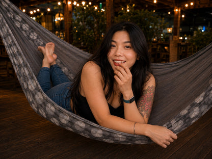 Moonstone Solstice Premium Hammock playful close lifestyle photo with model smiling in the hammock
