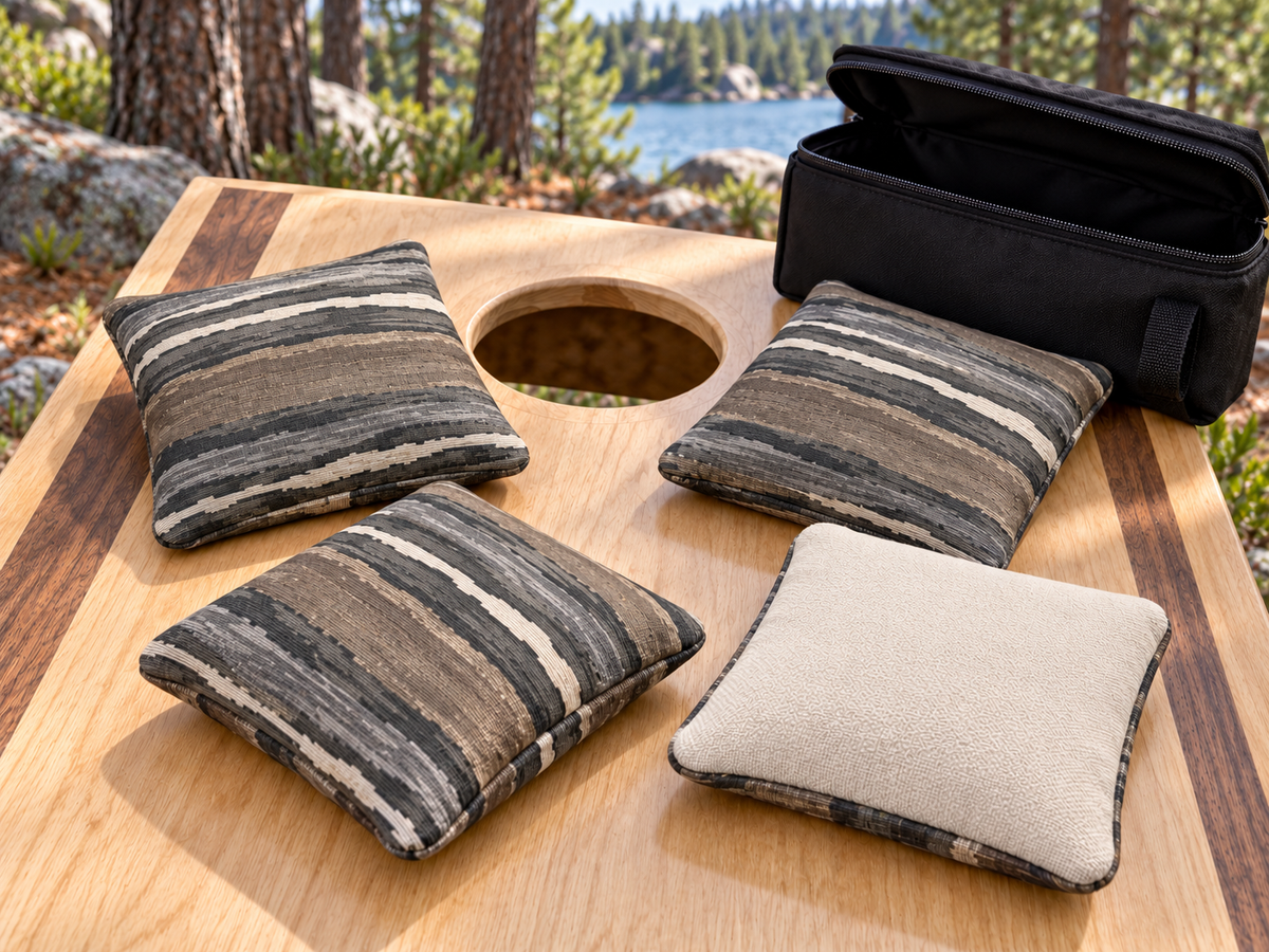 Four Premium Painted Stripe Brown cornhole bags with cream Maglite reverse and black carrying case