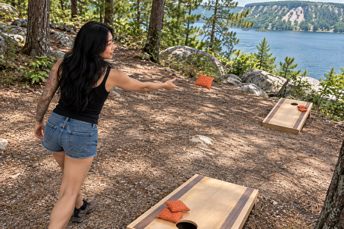 Mini Bo throwing a Spark Flow Inferno cornhole bag at Devil's Lake, Wisconsin